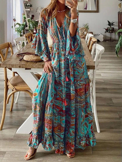 Bohemian Maxi Dress with Paisley Print and Trumpet Sleeves | Gayle