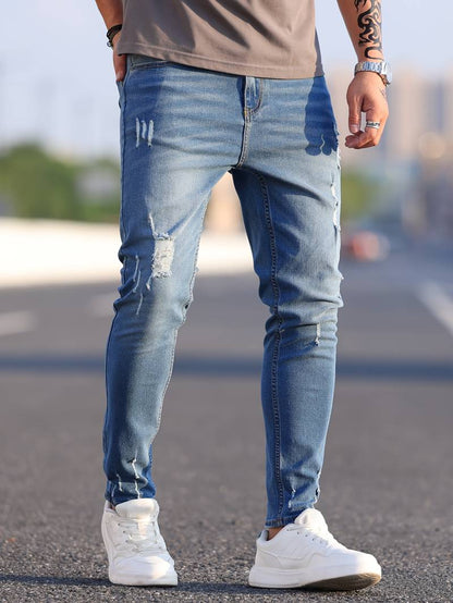 Slim-Fit Distressed Denim Jeans | Kavanaugh